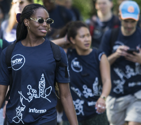 Informa people in the walk the world t-shirts walking