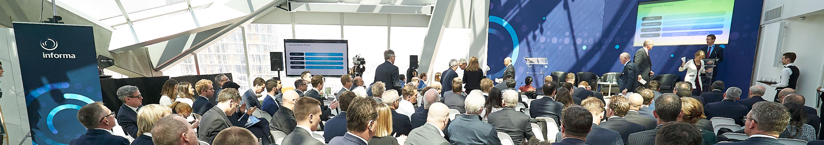 Informa investors seated at Informa's office at 240 Blackfriars office, ready to listen to a presentation at the 2019 Investors Day